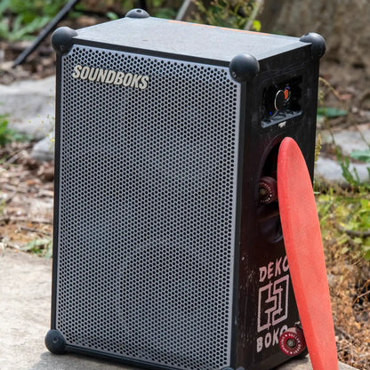 Metallic grey Soundboks 4 in outdoor setting.